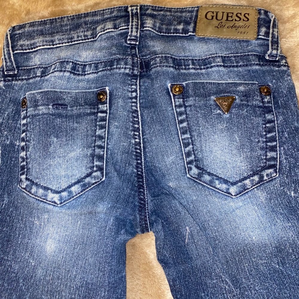 Guess dark blue jeans bottoms are regular